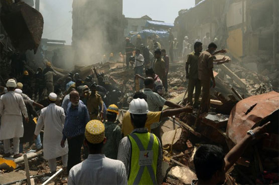 Mumbai building collapse kills 12 after heavy rains