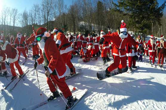 Skiing Santas ho-ho-hold court at ski resort's annual bash