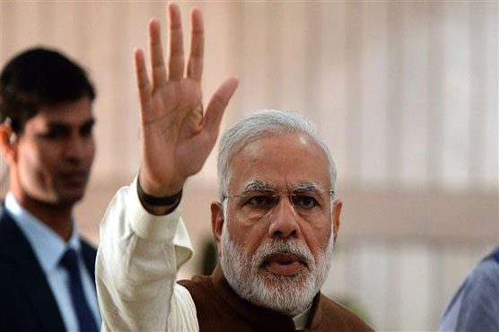 India's Modi faces key test as home state votes