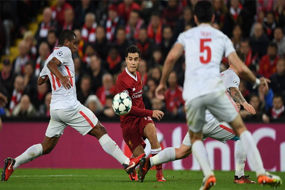 Football: 'Fab Four' fire seven-goal Liverpool into last 16