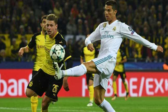 Football: Ronaldo breaks new ground as Madrid edge out Dormund