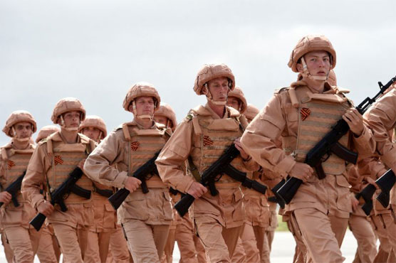 On Mideast trip, Putin orders partial withdrawal from Syria