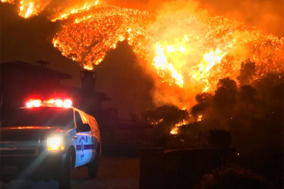 Thousands flee as wildfire 'beast' grows to California's third-largest