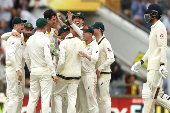 Australia poised to secure Ashes despite rain