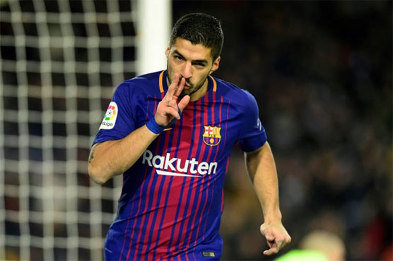 Football: Suarez, Paulinho move Barca 11 clear of Real