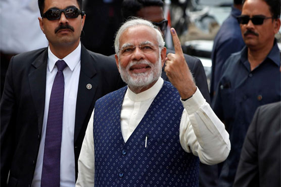 India ruling party pulls ahead in election in Modi state after tight race