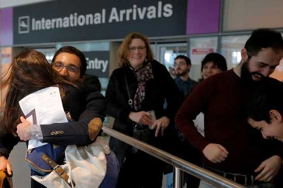 Judge blocks Trump's travel ban; White House to appeal