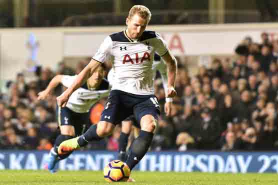 Football: Kane keeps Spurs title hopes burning