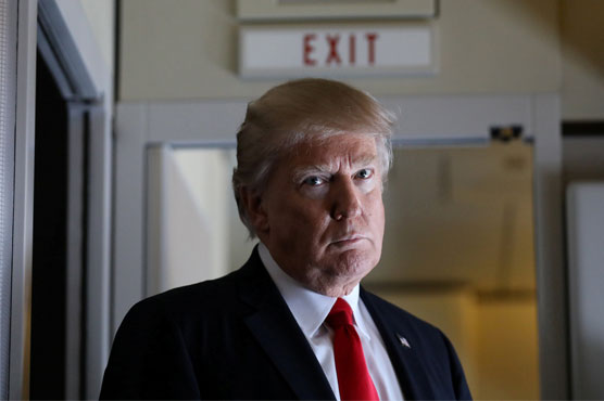 Trump steps up attack on judge, court system over travel ban