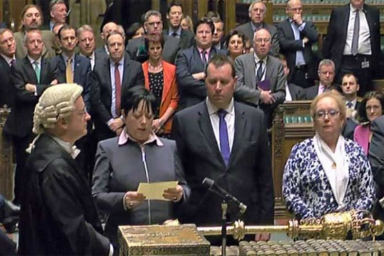 British MPs approve bill to start Brexit