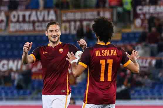 Football: Roma rout Torino to keep title dream alive