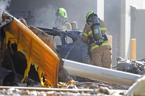 Five die as light plane crashes into mall in Australia