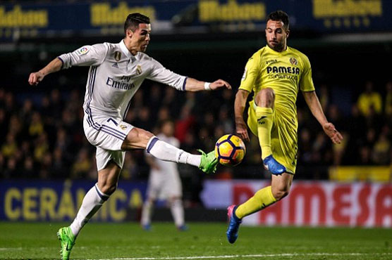 Real battle back to win at Villarreal and stay top of La Liga