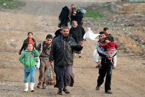 Frightened civilians flee as Iraq forces battle IS in Mosul