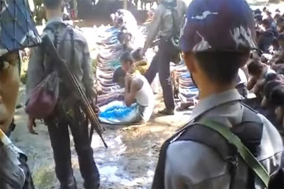 Myanmar detains police over Rohingya abuse video