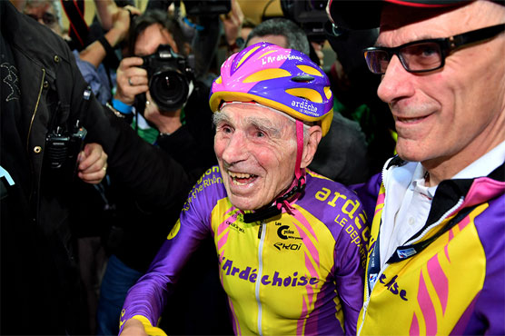 105-year-old Frenchman pedals into history books