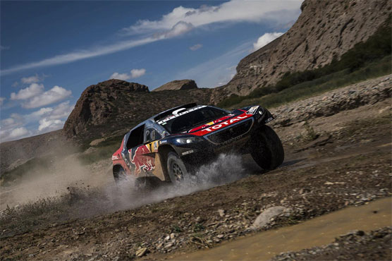 Rallying: Loeb wins stormy stage as Peterhansel takes Dakar lead