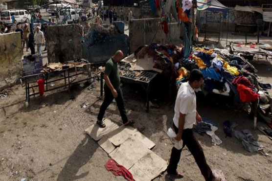 Suicide bomber kills at least 11 at Baghdad market