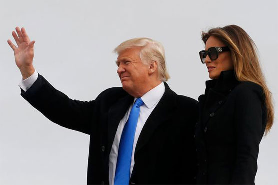 Trump arrives in Washington to lay claim to White House