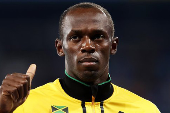 Bolt loses gold after team-mate fails drug test