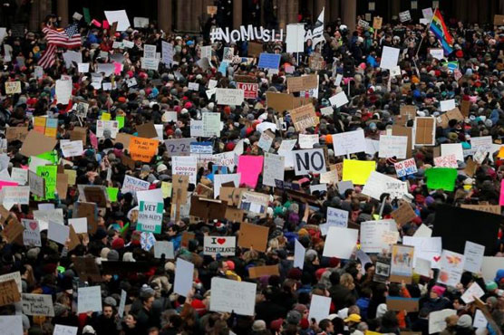 Tens of thousands in U.S. cities protest Trump immigration order