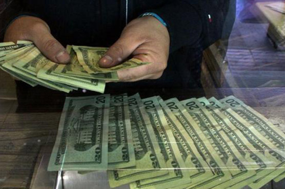 Dollar, Asia markets down as dealers hit by Trump woe