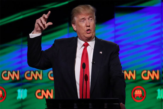 Trump tweets mock video of himself tackling, punching CNN logo