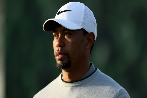 Golf: Woods released from programme, to continue treatment