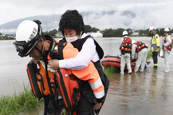 Rescuers scramble to find missing after Japan floods
