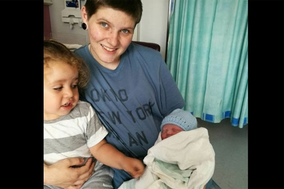 Britain's first transgender man gives birth to baby girl
