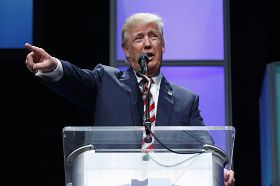 U.S. judge narrows travel ban in defeat for Trump