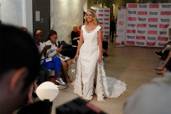 Here comes the bride... all dressed in toilet paper