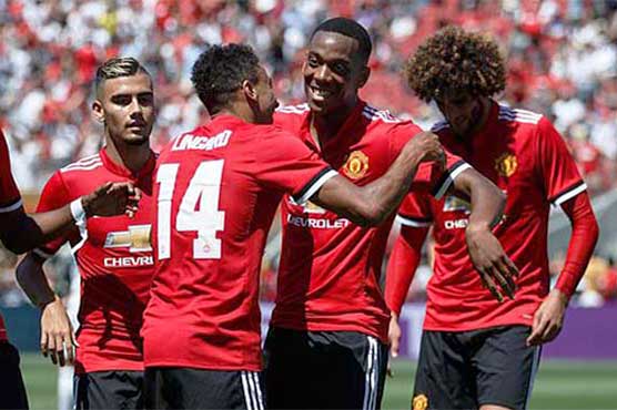 Football: Manchester United edges Real Madrid on penalty kicks
