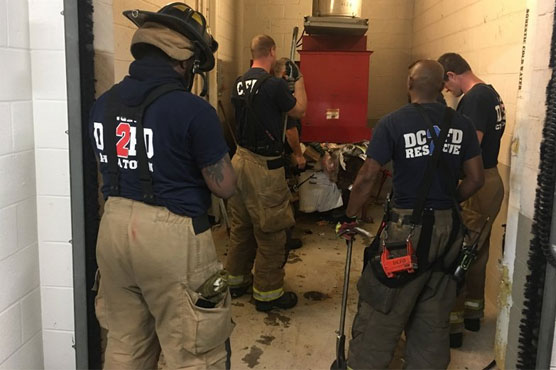 That stinks! Man seeking dropped phone falls in trash chute
