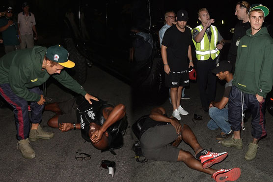 Justin Bieber hits photographer with his car