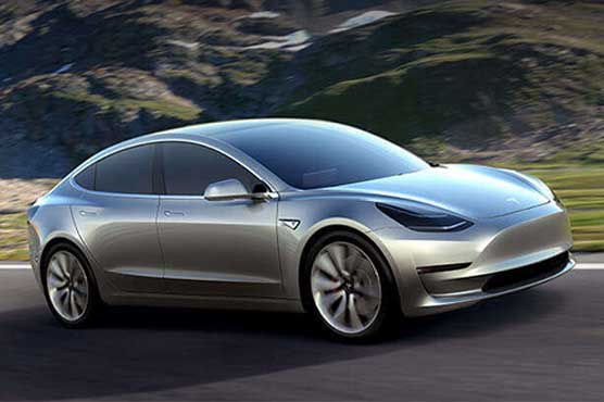 Tesla begins delivering 'Model 3' car for the masses