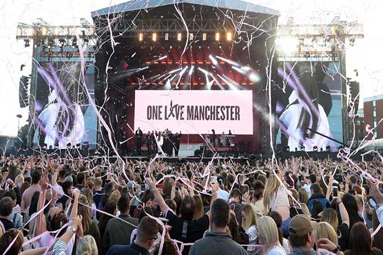 Music stars unite in Manchester as fans face down fears