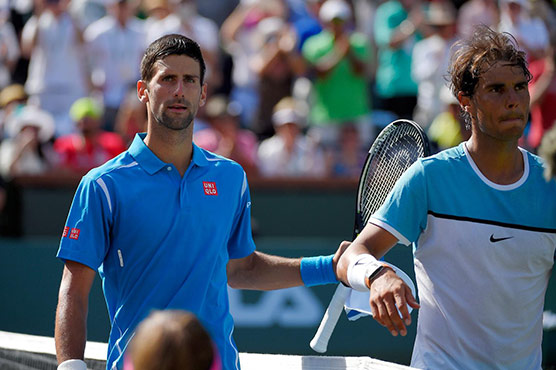 Rain pushes Nadal, Djokovic quarter-finals to Wednesday