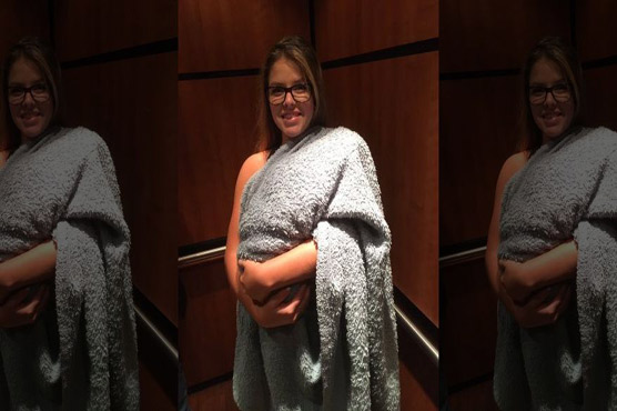 Lady sneaks Dog in a hospital in California pretending it was a baby