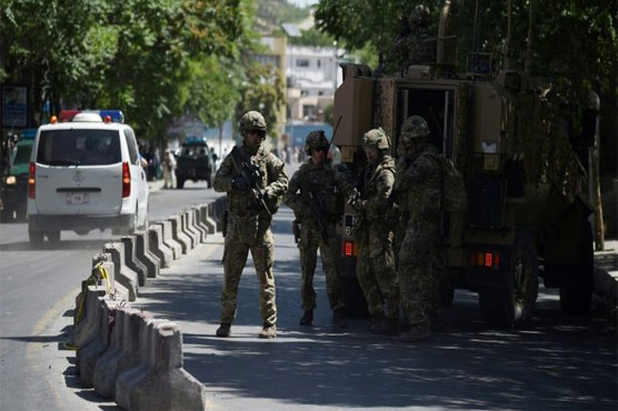 Gunmen kill eight Afghan guards at largest US base