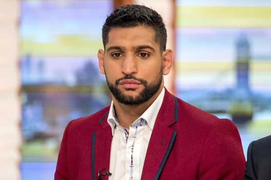 Boxer Amir Khan fears for family's safety after London terror attacks
