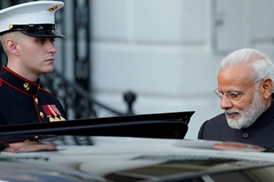 US marine opens door for Modi's wife, only to find that she is not there