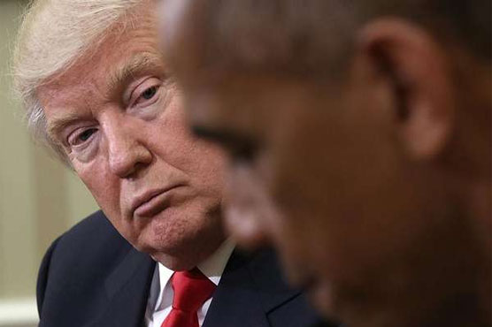 Trump blames Obama for protests, security leaks