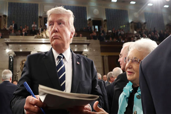 Officials: New Trump travel ban removes Iraq from list