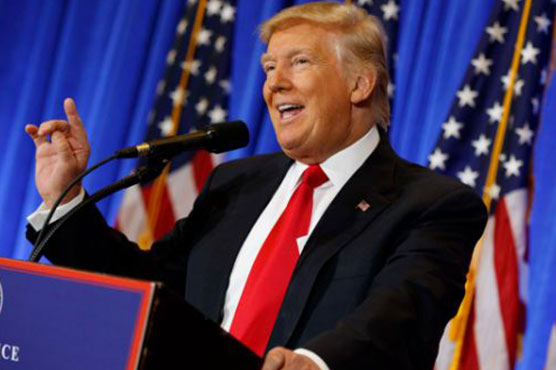 Trump defiant as new Russia ties emerge