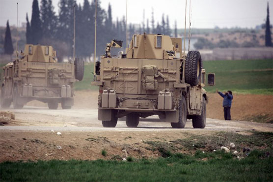 Russian, Syrian regime convoys enter northern Syria city