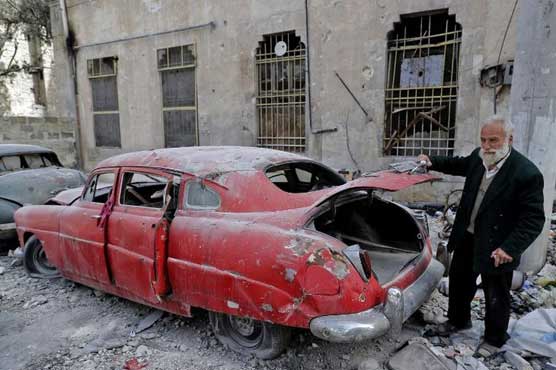 Aleppo car lover aims to revive his 'wounded' classics