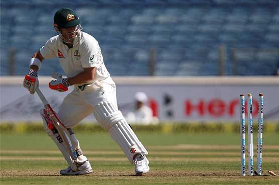 Warner bites his tongue, hopes to let bat do the talking