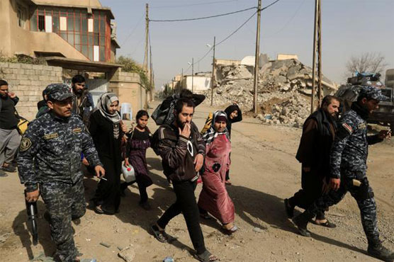 Iraqi forces take third of west Mosul, militants 'trapped'
