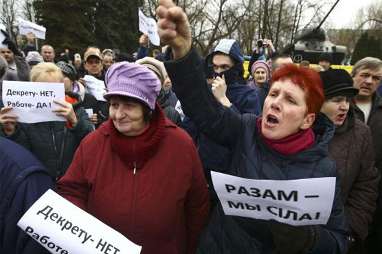 Belarussians protest tax on 'parasites' despite concessions